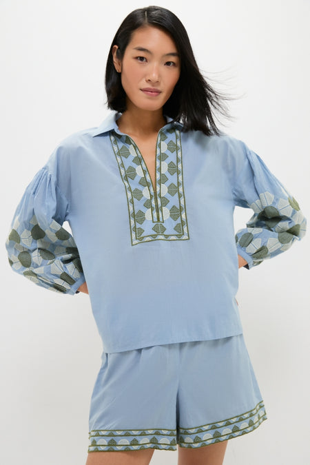 Woman modeling the Sky Geometric Embroidered Paget Top, showcasing a classic, effortless two-piece look with geometric embroidery and blouson sleeves, perfect for high-end, fun summer outings.
