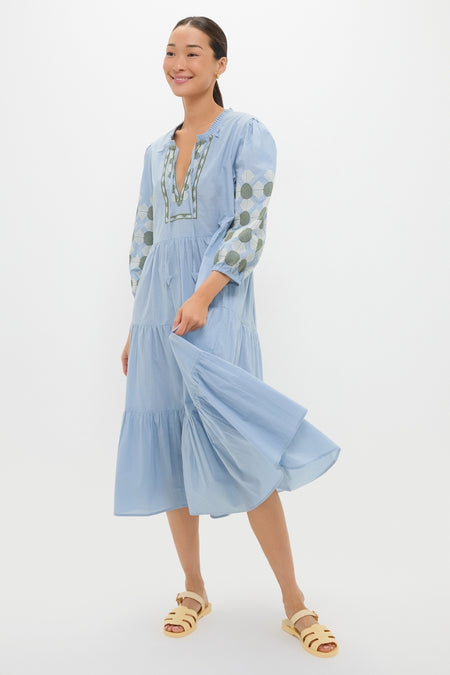 Person wearing the Sky Geometric Embroidered Long Sleeve Salty Paloma Caftan, showcasing its classic, effortless design with fun embroidery, perfect for a high-end, summery look.