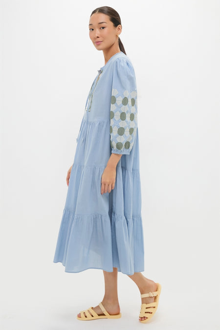 Model wearing the classic Sky Geometric Embroidered Long Sleeve Salty Paloma Caftan, showcasing effortless style with its fun geometric pattern and high-end design.