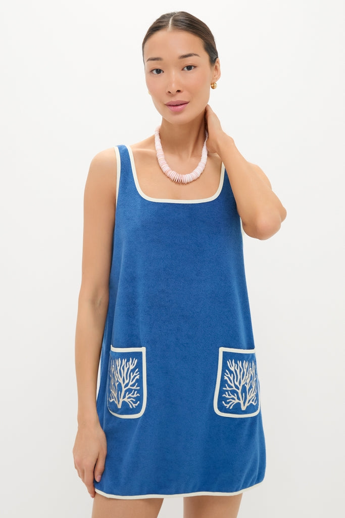 Cobalt Embroidered Terrycloth Dress Coverup: A classic, sleeveless A-line mini dress with coral embroidery, exuding effortless high-end style, perfect for fun summer outings.
