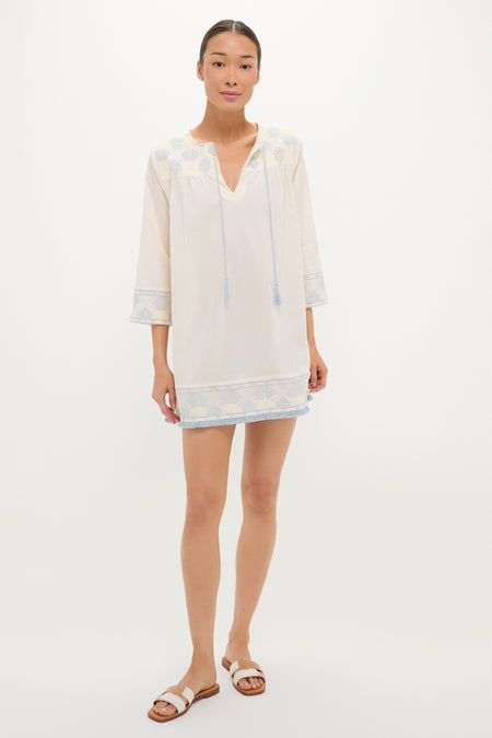 Neblina Geometric Embroidered Bondi Coverup: A classic, effortless tunic-style mini dress with three-quarter sleeves, featuring fun, high-end geometric embroidery and tassel ties.