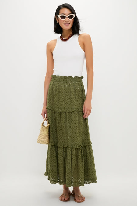 Model wearing the classic Fern Eyelet Prado Skirt, showcasing its effortless tiered design and ruffled waistband, paired with a fun, high-end summer ensemble.