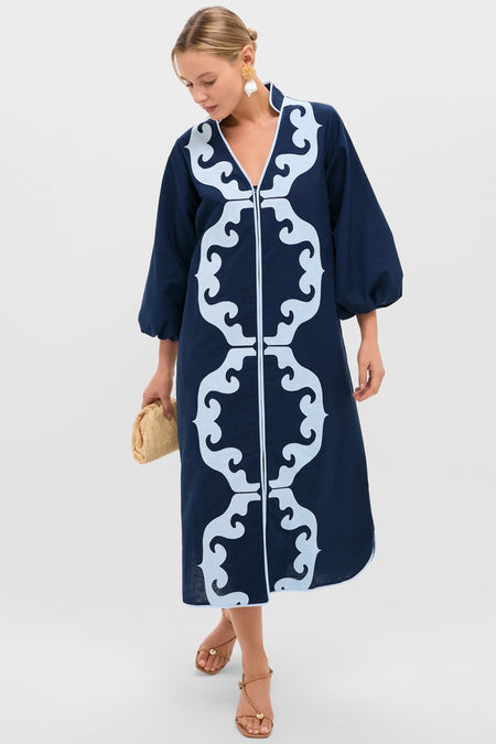 Woman modeling the Navy & Baby Blue Embroidered Teresa Caftan with V-neck, three-quarter balloon sleeves, and side slits, capturing a classic, effortless high-end style.