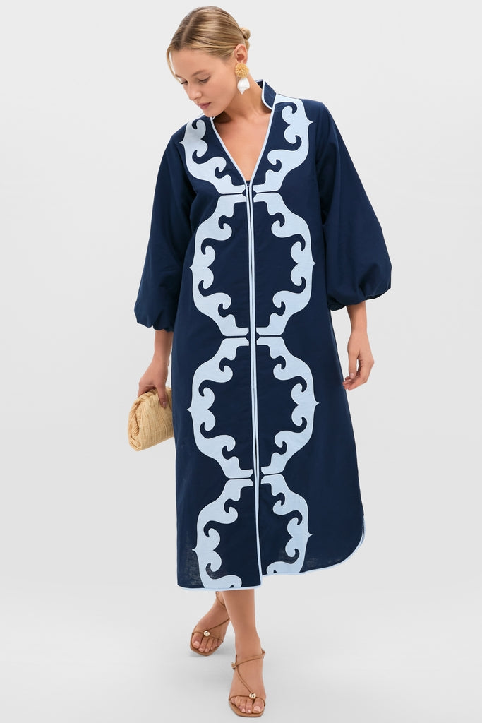 Woman modeling the Navy & Baby Blue Embroidered Teresa Caftan with V-neck, three-quarter balloon sleeves, and side slits, capturing a classic, effortless high-end style.
