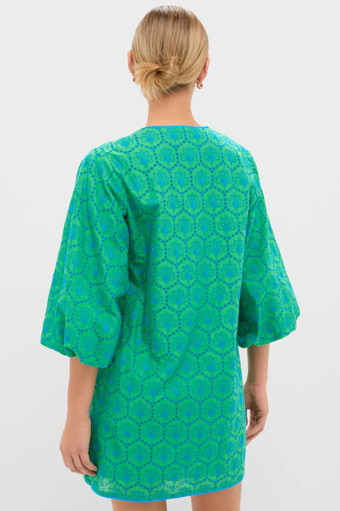 Person wearing a classic, high-end Seafoam Palm Eyelet Mini Arem Caftan with effortless puffed sleeves and a fun eyelet pattern, embodying Tuckernuck's cool style.