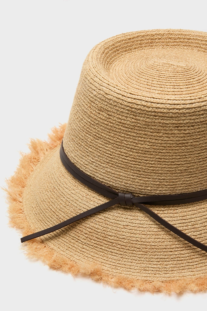 Natural and Chocolate Zoe Lampshade Hat, a classic woven straw sun hat with an effortless, fun design featuring a leather band and slightly frayed edges for a high-end look.