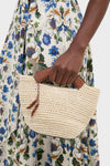 Natural Fique Small Shopper, a classic woven straw handbag with leather handles and tassels, offering an effortless, high-end touch to any fun, stylish outfit.