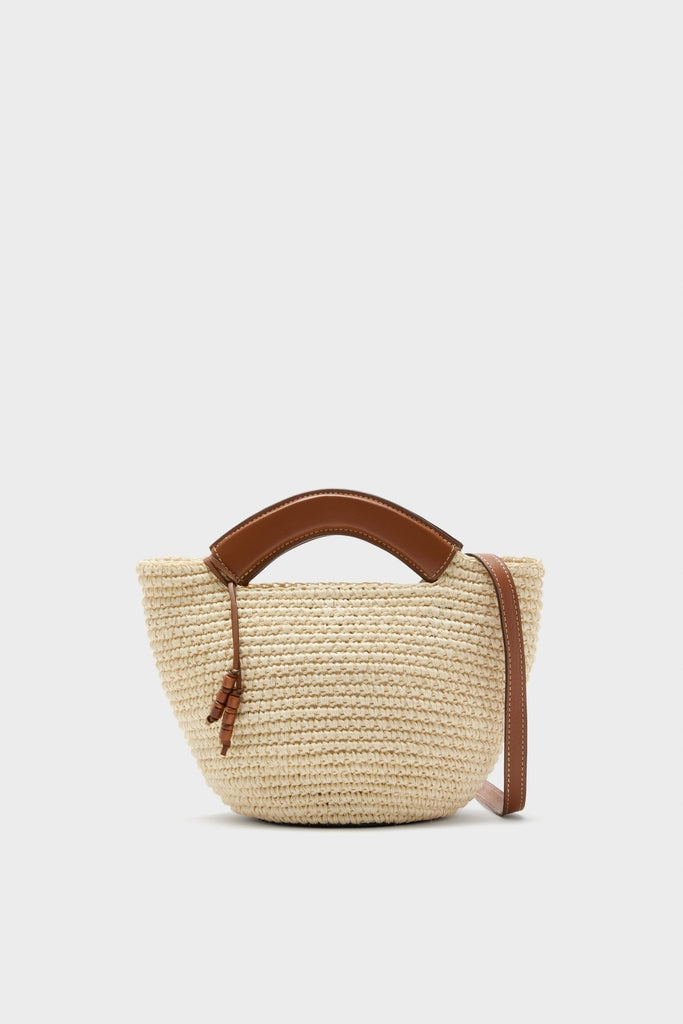 Natural Fique Small Shopper: A classic, hand-woven straw tote with an effortless design, featuring a brown leather handle, shoulder strap, and tassel for a fun, high-end look.
