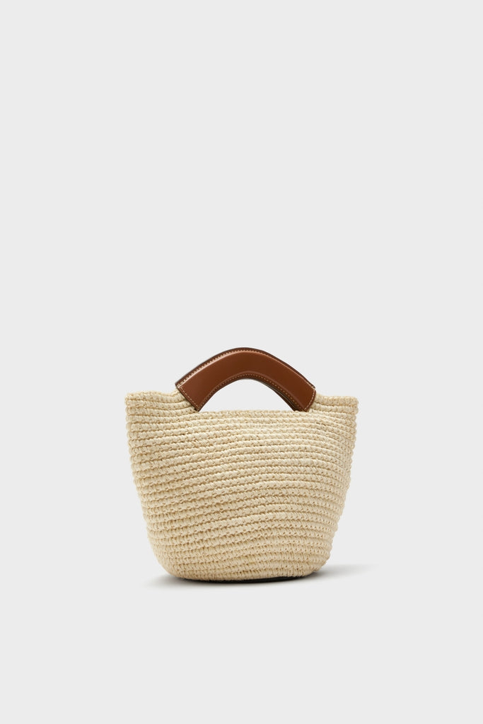Natural Fique Small Shopper: A classic, hand-woven straw tote with an effortless bucket-style and short leather handle, perfect for high-end, fun shopping adventures.