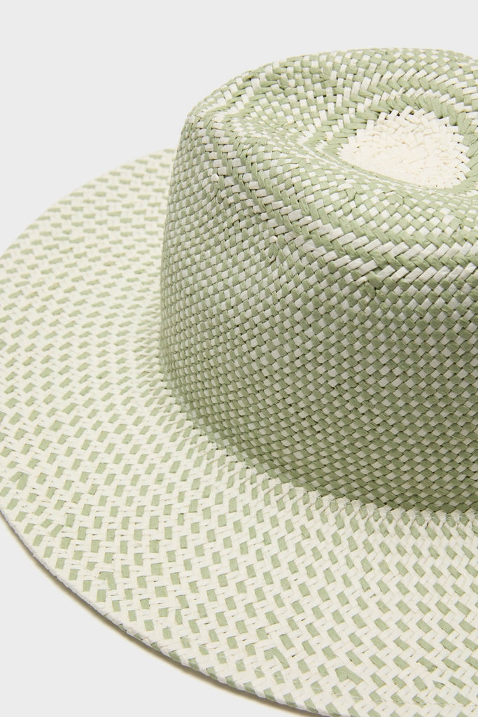 Classic Sage Novelty Packable Hat with pale green and off-white woven design, featuring intricate detailing, adjustable strap, and ventilated crown for an effortless, high-end getaway style.