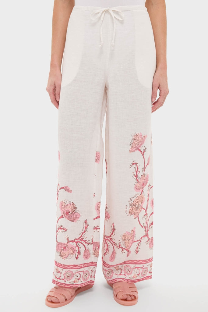 Hibiscus Bloom Pink Florentine Pants showcase a classic, effortless style with a relaxed silhouette, pink floral print, and adjustable drawstring, perfect for a high-end, fun getaway.