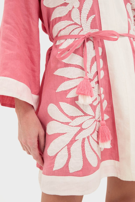 Flora Pink Lumi Mini Dress: A classic, effortless tunic-style dress with white leaf embroidery and a fun, high-end self-fabric belt featuring pink and white tassels.