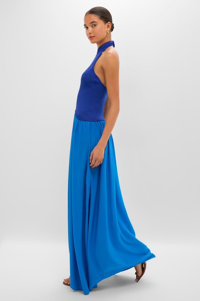 Cosmic Blue Soglio Halter Maxi Dress: Classic and effortless, this fun, high-end ensemble features a sleek halter top and flowing skirt, embodying chic sophistication.