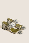 Natural Snake Olympia Block Heel Mules: Classic open-toe sandals with effortless snakeskin texture, featuring a fun gold-accented toe loop and high-end block heel for versatile style.