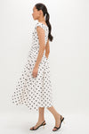 Effortless elegance in the classic Cream Polka Dot Cotton Midi Dress, featuring a playful sweetheart neckline and gathered waist, paired with high-end slingback sandals.