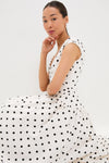 Classic Cream Polka Dot Cotton Midi Dress features a playful off-shoulder design and full flared skirt, embodying effortless elegance and fun for high-end style.