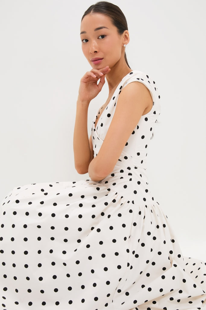 Classic Cream Polka Dot Cotton Midi Dress features a playful off-shoulder design and full flared skirt, embodying effortless elegance and fun for high-end style.