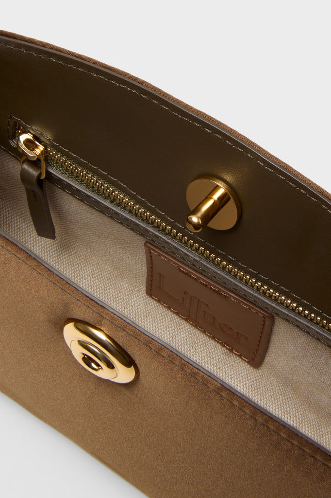 Brown Satin Pushlock Clutch interior, featuring a beige fabric lining, gold-tone magnetic snap closure, matching gold zipper, and leather brand tag, exuding classic, effortless high-end style.