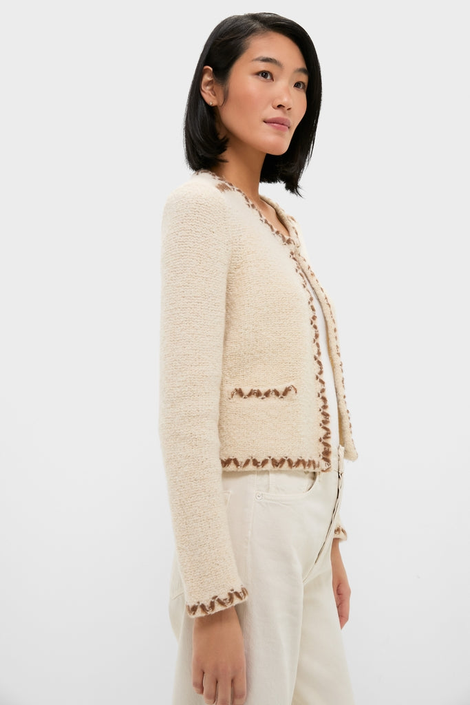 Ecru and Bronze Rochelle Cardigan on model, showcasing classic, effortless style with contrasting whip-stitch trim and a flattering fit. Perfect for a high-end, fun winter wardrobe.