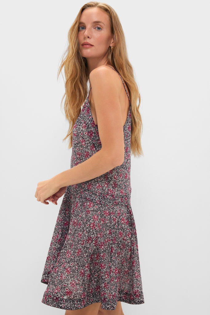 Crushed Berry Danielle Dress: A classic, effortless mini with a fun floral pattern, perfect for high-end, summery looks. Ideal for a chic, modern style.