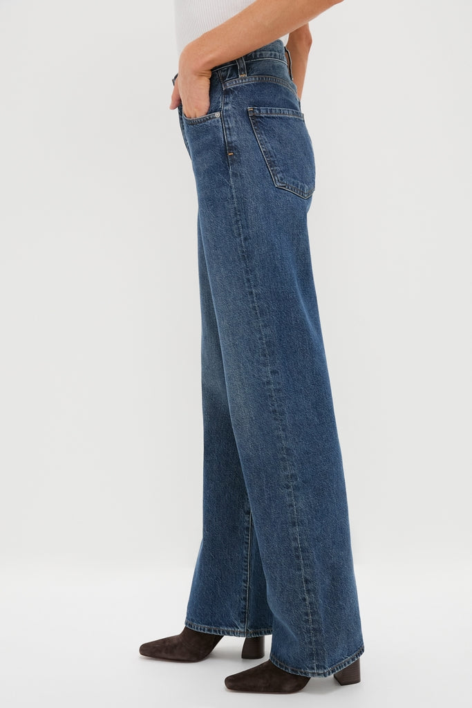 Westwood Annina Straight Leg jeans create a classic, effortless look with high-rise, wide-leg design, paired with high-end, fun dark brown ankle boots for confident style.