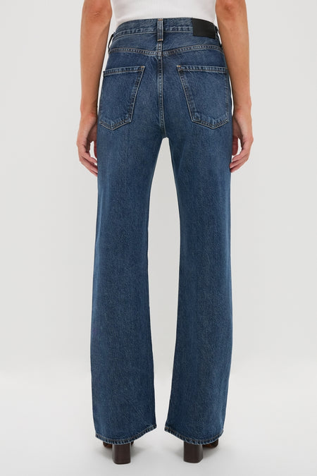 Westwood Annina Straight Leg jeans offer a classic, effortless look with their high-rise, slightly flared design, paired stylishly with dark brown boots. Perfect for a high-end, fun style.