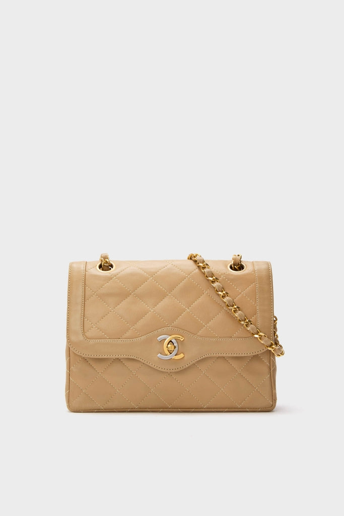 CHANEL CC Mini Paris Double Flap Bag: a classic, high-end quilted leather shoulder bag with gold-tone chain strap and signature double “C” clasp, offering effortless, fun elegance.