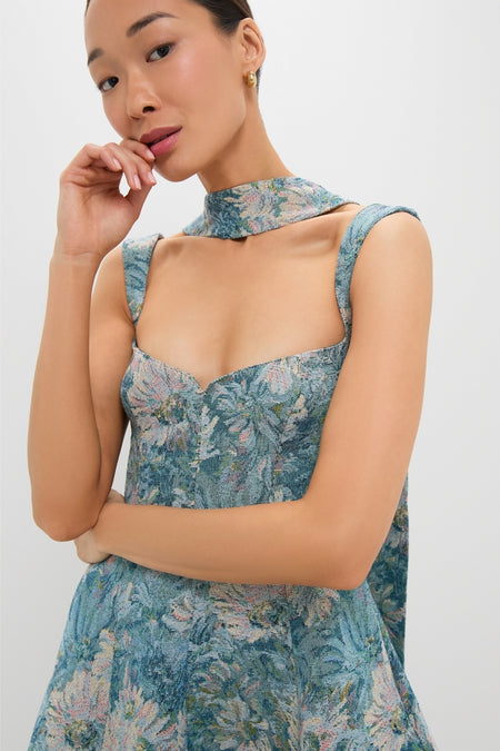Aquarelle Jacquard Rue Mini Dress: A young woman models this classic, effortless high-end dress with a floral tapestry print, square neckline, and matching choker, embodying fun elegance.