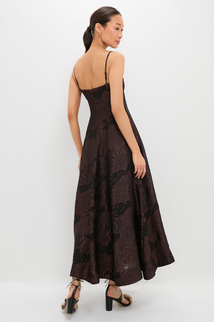 Model in the Arabica Jacquard Theron Midi Dress, showcasing its classic, high-end style with an effortless fit and fun A-line skirt, paired with chic block-heel sandals.