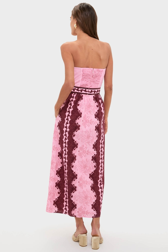 Blush and Maroon Abstract Bennet Midi Dress, showcasing an effortless, classic design with a smocked back, floral motifs, and side pockets. Paired with beige block-heeled sandals.