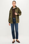 Model wearing the Dusky Green Modern Tartan Beadnell Casual Jacket, featuring a classic, effortless style with a corduroy collar, patch pockets, and a zip-and-snap closure.