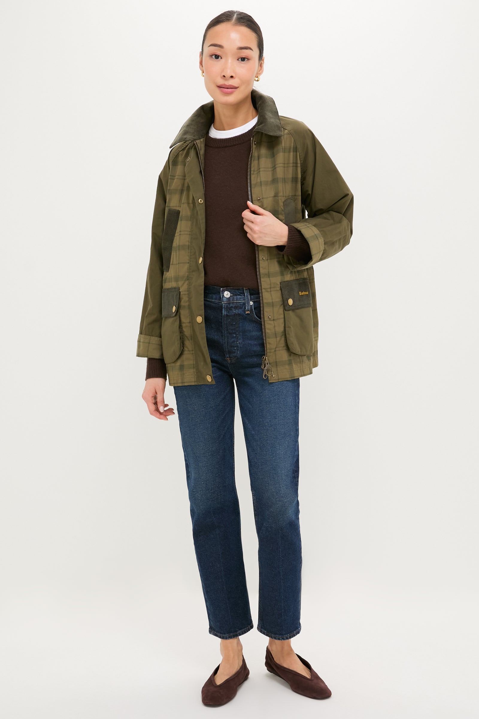 Model wearing the Dusky Green Modern Tartan Beadnell Casual Jacket, featuring a classic, effortless style with a corduroy collar, patch pockets, and a zip-and-snap closure.