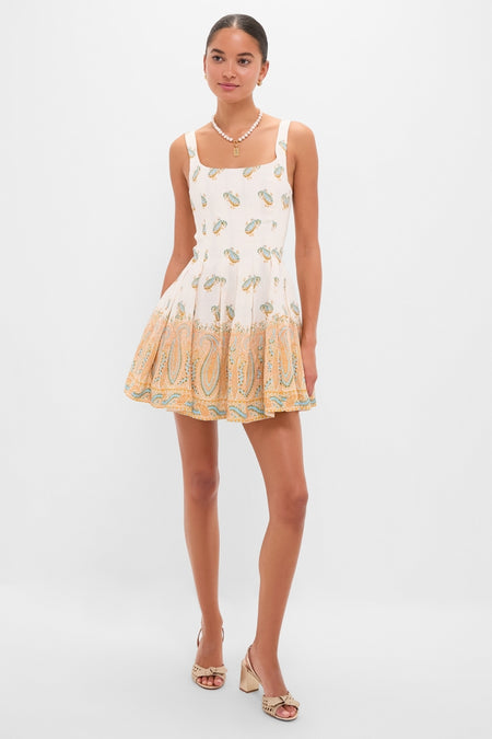 Cree Jardin Bodice Mini Dress: A classic, effortless linen dress with a structured bodice, perfect for fun, high-end alfresco days. Model accessorized with sandals and jewelry.