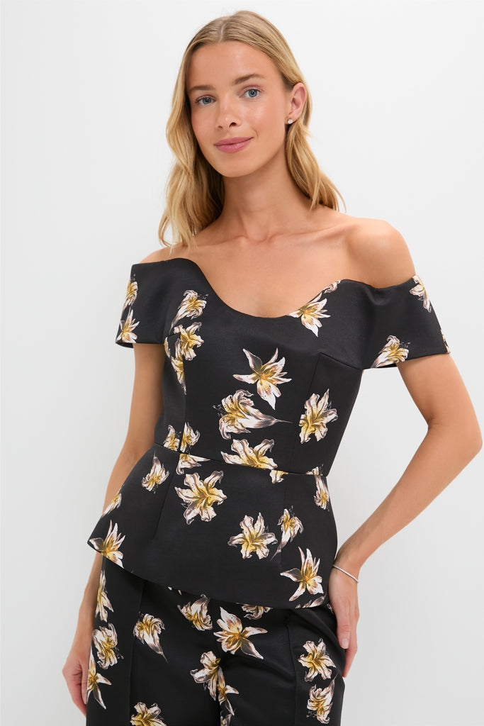 Model showcasing the Black and Yellow Souline Top with matching high-waisted trousers, featuring classic and effortless floral design, ideal for a fun, high-end look.