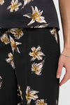 Black and Yellow Daffy Trousers feature a classic, effortless design with stylized lilies. Pairing fun and high-end style, these trousers embody Tuckernuck's cool confidence.