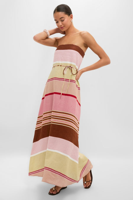 Young woman models the classic Dust Mauve Barragan Stripe Yolina Maxi Dress, showcasing its effortless A-line silhouette and fun, high-end design, perfect for versatile wear.