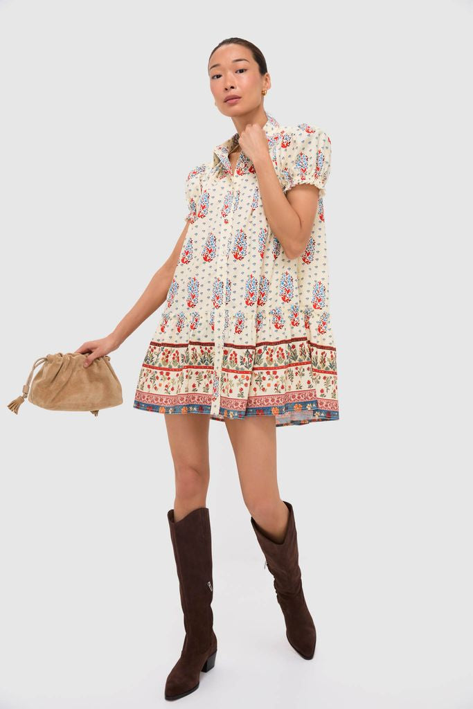 Young woman models classic, effortless Dark Brown Suede Virona H2O Boots with chic, fun dress and slouchy handbag; perfect for a high-end, confident look.