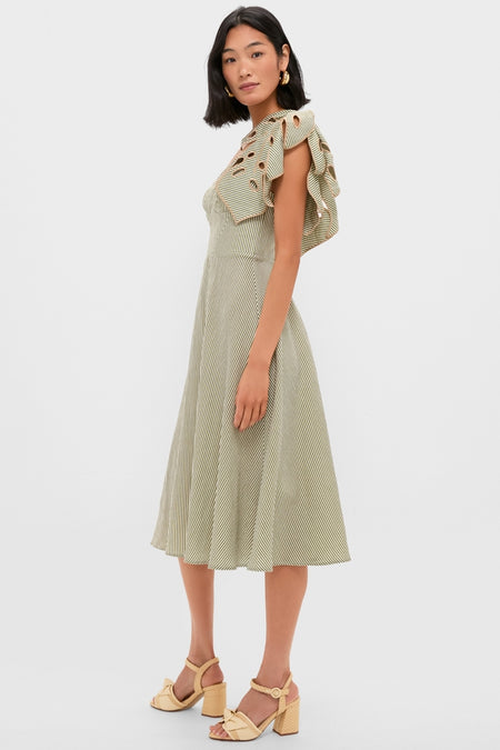 Model wearing the classic Green Striped Monsterea Leaf Sleeveless Midi Dress with dramatic ruffle sleeves and a flared skirt, paired with beige block-heel sandals for an effortless, high-end look.