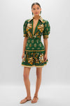 Ayla Green Mini Dress: A classic, effortless mini dress with a floral print, featuring a V-neckline, puffed sleeves, and a tiered skirt, styled with simple accessories.