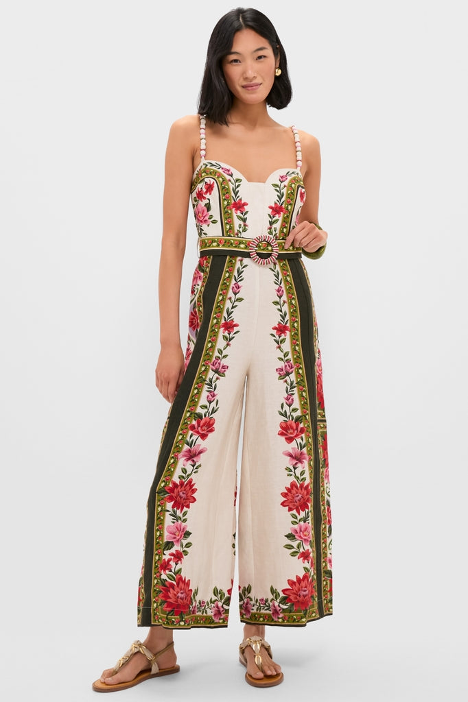 Wonder Rio Sand Sleeveless Maxi Jumpsuit, an effortlessly high-end piece featuring a classic sweetheart neckline, wide legs, beaded straps, and a playful floral pattern.