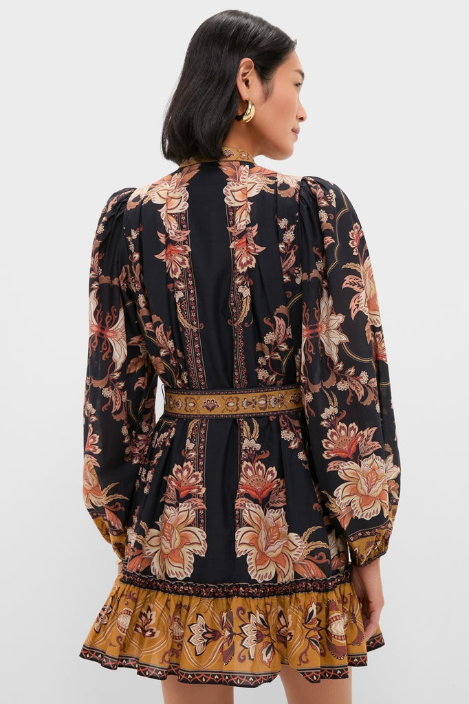 Woman in a Majestic Garden Black Mini Dress with floral print, showcasing classic, effortless style; perfect for a fun, high-end look.