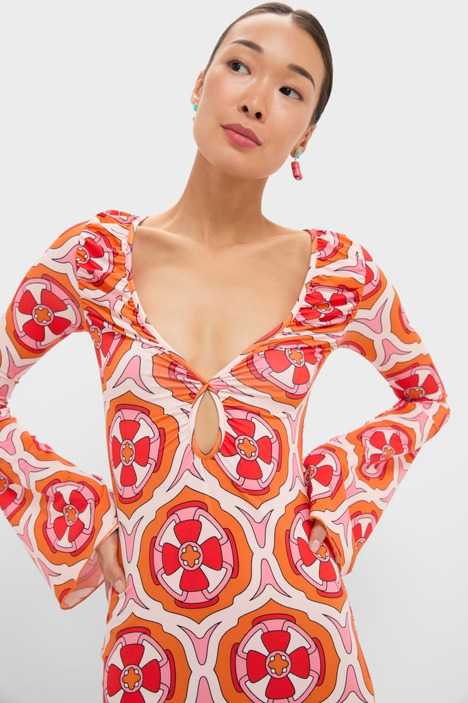 Model wearing Pink Retro Radiance Diana Bell Maxi Dress with classic keyhole cutout and soft bell sleeves, embodying effortless, high-end fun for a warm-weather escape.