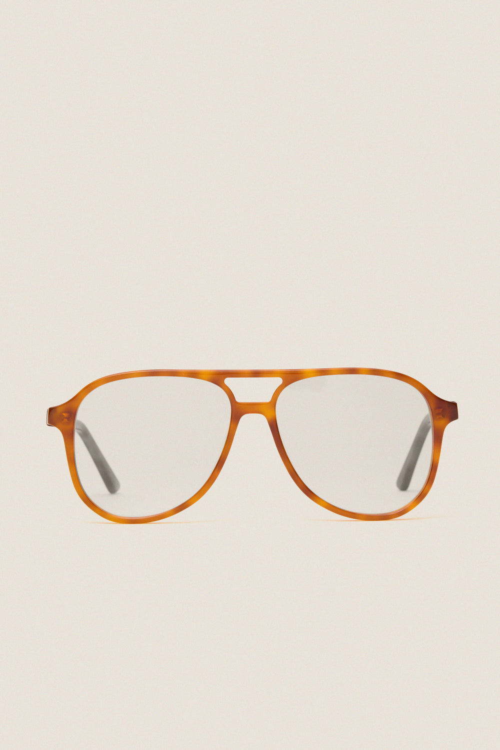 Maple Blue Light Scout Glasses feature classic tortoiseshell aviator frames with clear lenses, offering effortless style and high-end protection for fun, adventurous days.