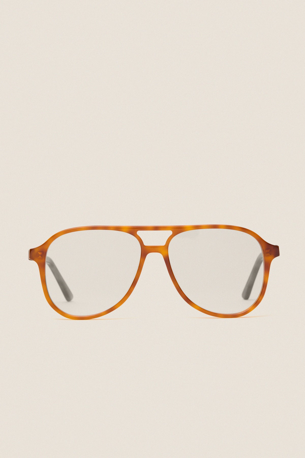 Maple Blue Light Scout Glasses feature classic tortoiseshell aviator frames with clear lenses, offering effortless style and high-end protection for fun, adventurous days.