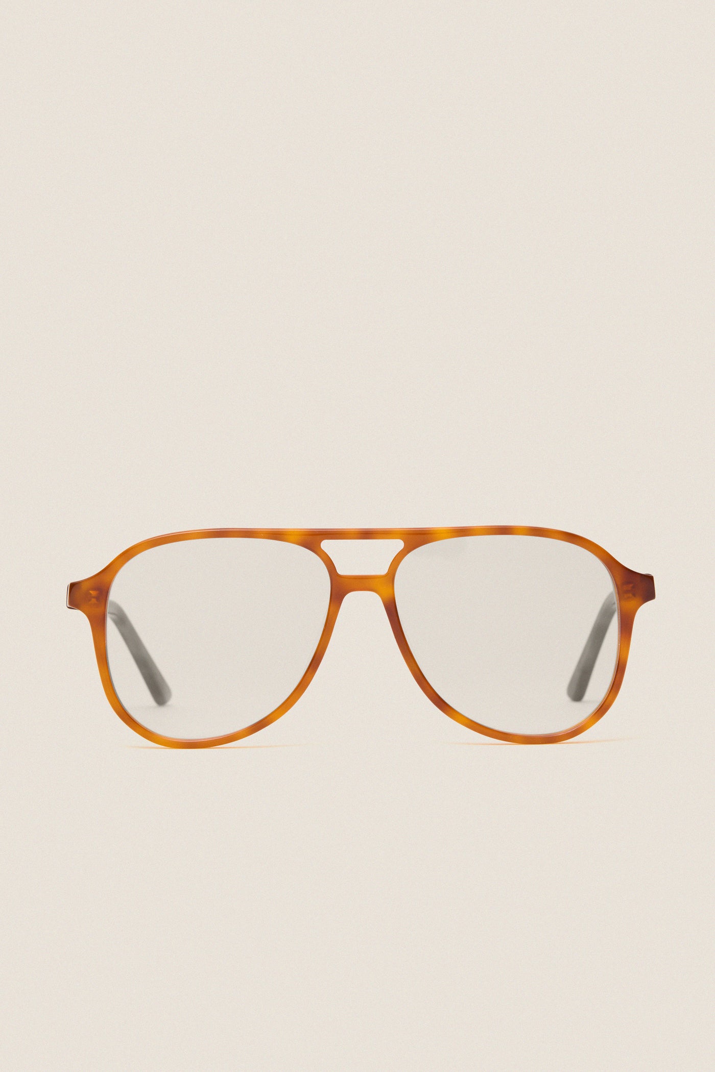 Maple Blue Light Scout Glasses feature classic tortoiseshell aviator frames with clear lenses, offering effortless style and high-end protection for fun, adventurous days.