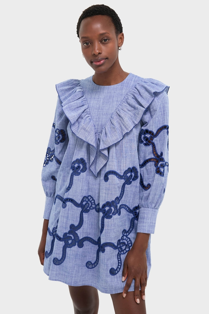 Seabank Chambray Azalea Dress: An effortlessly fun, high-end mini dress with classic V-shaped ruffle and intricate rope-like embroidery, perfect for a confident, stylish look.