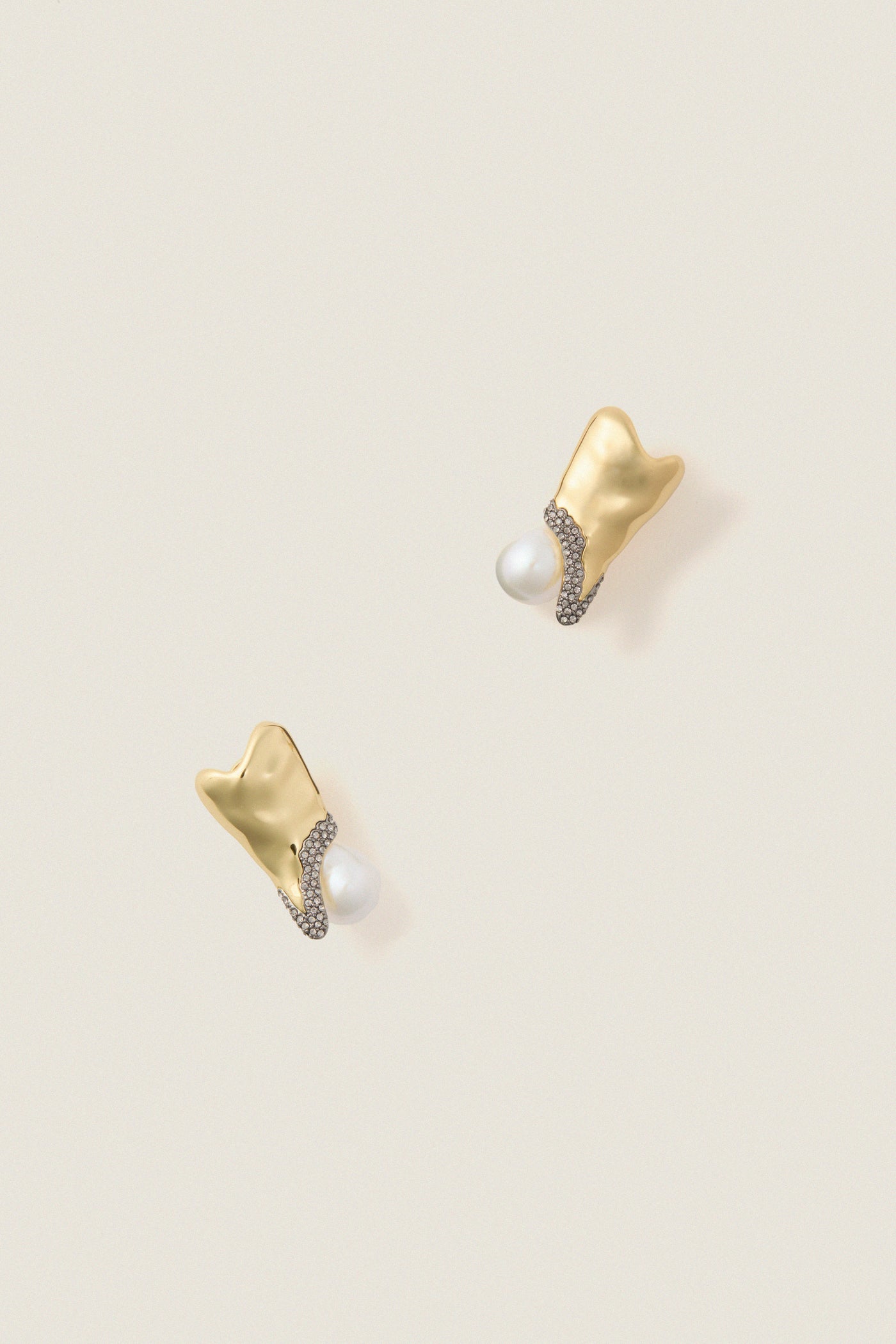 Gold and Pearl Spencer Earrings: Classic gold-tone earrings with baroque pearls and pavé crystals, offering an effortless, high-end touch for fun, elegant evenings.