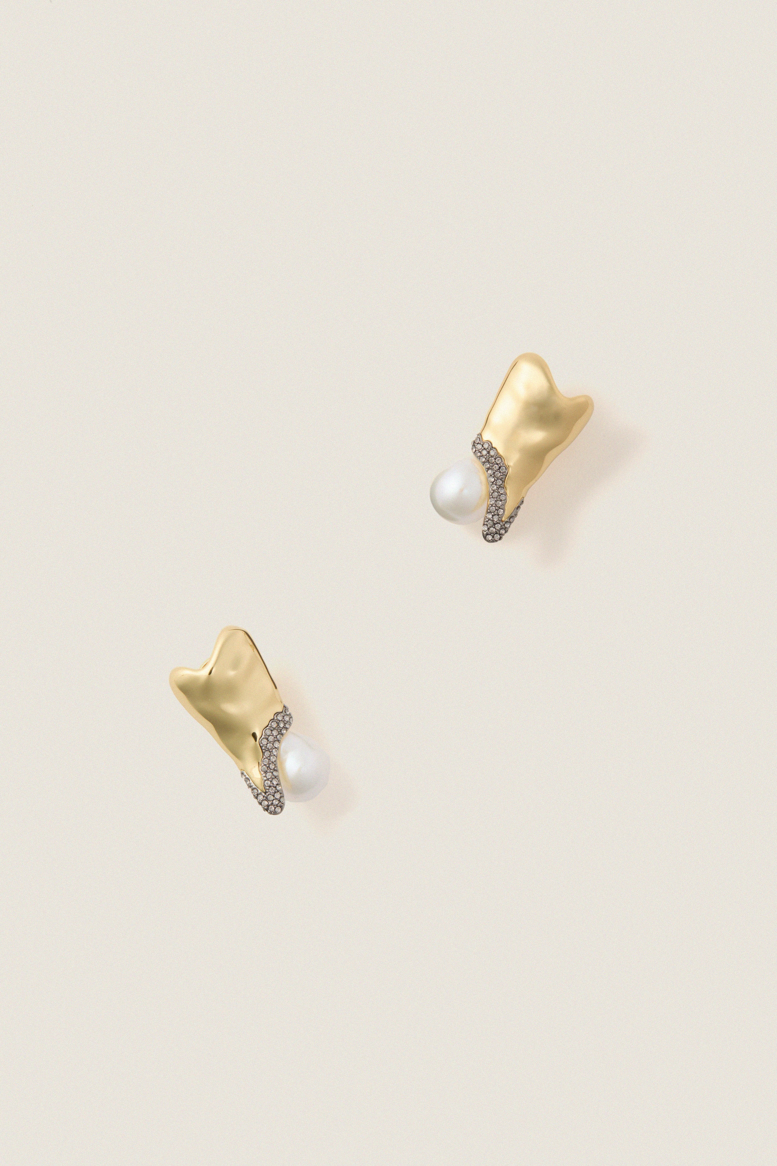 Gold and Pearl Spencer Earrings: Classic gold-tone earrings with baroque pearls and pavé crystals, offering an effortless, high-end touch for fun, elegant evenings.