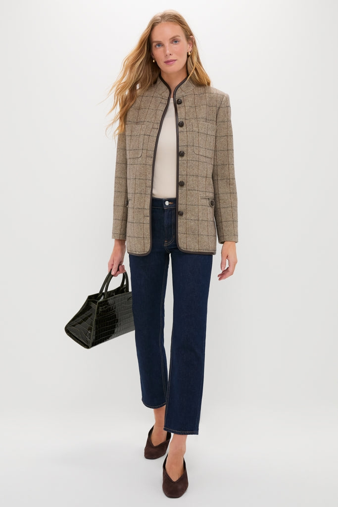 Model holding the classic Cypress Croc Embossed Veronica Beard Dash Bag, paired with an effortless brown-tweed jacket and fun, high-end accessories, embodying Tuckernuck's cool and confident style.