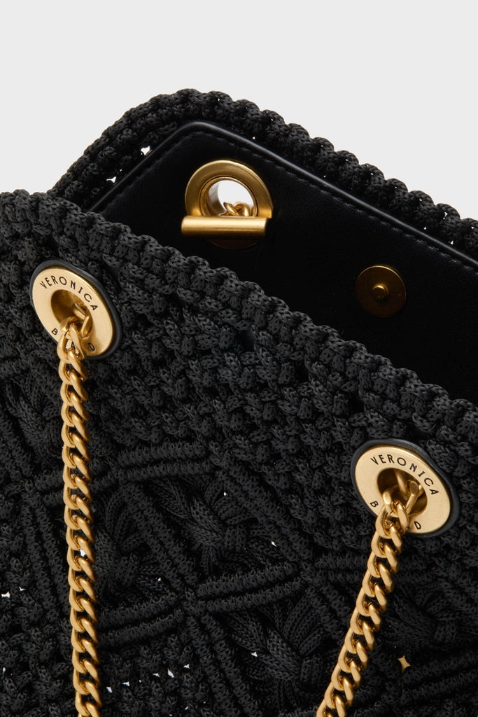 Black Small Macrame Veronica Beard Slouch Bag featuring a classic hand-crocheted design, gold-tone chain strap, and matching hardware, embodying an effortless, fun, high-end style.